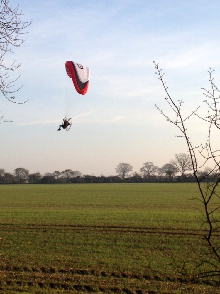 paramotor flying above Great Notley